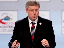 Prime Minister Stephen Harper delivers a speech as part of the Francophonie Summit in Montreux, Switzerland on Saturday, Oct. 23, 2010. (Sean Kilpatrick / THE CANADIAN PRESS)