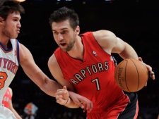 Toronto Raptors' Andrea Bargnani (7), of Italy, drives past New York Knicks' Danilo Gallinari (8), also of Italy, during the first half of an NBA basketball game Wednesday, Dec. 8, 2010, in New York. (AP Photo/Frank Franklin II)