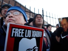 Protestors demand the freedom of Nobel peace laureate Liu Xiaobo Thursday Dec. 9, 2010 outside the Chinese Embassy in Oslo, Norway. 