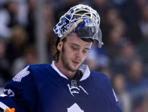 Toronto Maple Leafs Jonas Gustavsson reacts after letting in Carolina Hurricanes' Patrick Dwyers' game winning goal during third period NHL hockey action in Toronto on Tuesday December 28, 2010.THE CANADIAN PRESS/Chris Young