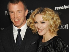 Director Guy Ritchie and his wife Madonna attend a special screening of 'Revolver' on Dec. 2, 2007. (AP / Evan Agostini)