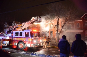 Firefighters battle a blaze in Hamilton early Wednesday, Feb. 20, 2013. (Andrew Collins/CP24)