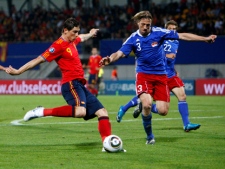 Fernando Torres, left, scores for Spain against Liechtenstein during a Euro 2012 qualifying soccer match in Vaduz, Liechtenstein on Friday, Sept.3, 2010. Torres is close to joining Premier League side Chelsea from Liverpool. (AP/Michael Probst)