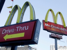 McDonald's signs are seen in this Dec. 20, 2010, file photo. (AP/Richard Drew)