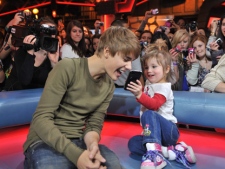 Justin Bieber brings out his sister Jazmyn on MuchMusic's NEW.MUSIC.LIVE on Tuesday Feb. 1, 2011, in Toronto, as he talks about his 3D doc "Justin Bieber: Never Say Never." (THE CANADIAN PRESS/CTV)