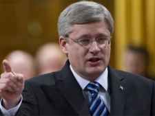 Prime Minister Stephen Harper answers a question during question period in the House of Commons on Parliament Hill in Ottawa on Wednesday Feb. 9, 2011. (THE CANADIAN PRESS/Sean Kilpatrick)