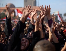 Anti-government protester continue to celebrate in Tahrir Square in downtown Cairo, Egypt , Saturday, Feb. 12, 2011. Egypt exploded with joy, tears, and relief after pro-democracy protesters brought down President Hosni Mubarak on Friday with a momentous march on his palaces and state TV. The ruling military pledged Saturday to eventually hand power to an elected civilian government and reassured allies that Egypt will abide by its peace treaty with Israel .(AP Photo/Emilio Morenatti)