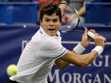 Milos Raonic returns a shot to Radek Stepanek in the Regions Morgan Keegan Championships tennis tournament Thursday, Feb. 17, 2011, in Nashville, Tenn. Raonic defeated Stepanek, 6-4, 6-7 (10), 7-6 (1). (AP Photo/Mark Humphrey)