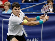 Milos Raonic returns a shot against Robert Kendrick in a quarter-final round match at the Regions Morgan Keegan Championships tennis tournament Friday, Feb. 18, 2011, in Memphis, Tenn. (AP Photo/Mark Humphrey)