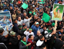 Pro-Gadhafi supporters gather in Green Square after traditional Friday prayers in Tripoli, Libya, Friday, Feb. 18, 2011.(AP / Abdel Meguid al-Fergany)