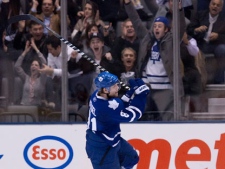 Toronto Maple Leafs Phil Kessel and Leaf fans celebrate his winning goal against New York Islanders during third period NHL action in Toronto on Tuesday, February 22, 2011. (THE CANADIAN PRESS/Chris Young)