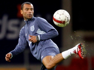 England's Ashley Cole controls the ball during a training session at Parken Stadium in Copenhagen, Denmark on Tuesday, Feb. 8, 2011. (AP Photo/Lars Poulsen)
