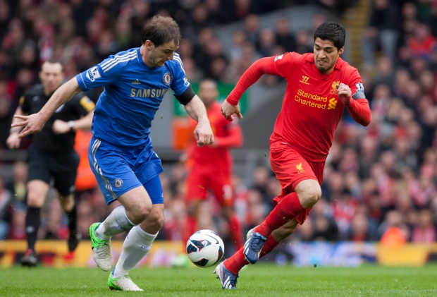 Luis Suarez bites Branislav Ivanovic