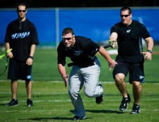 Toronto Blue Jays infielder Brett Lawrie, center, takes part in resistance sprints during baseball spring training in Dunedin, Fla., on Thursday, Feb. 17, 2011. (AP Photo/The Canadian Press, Nathan Denette)wb