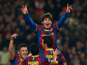 FC Barcelona's Lionel Messi celebrates after scoring against Arsenal during the second leg of their last-16 Champions League soccer match in Barcelona, Spain, Tuesday, March 8, 2011. Barcelona won 3-1 (4-2 on aggregate) (AP Photo/Siu Wu)