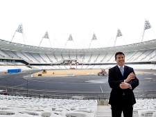 Seb Coe Chairman of the London Organizing Committee, poses for the media at the Olympic Stadium, as work continues to get it ready for the start of the 2012 Olympic Games in London, Tuesday, March, 15, 2011, the first day that 6.6 million tickets for the games went on sale. March 15 marks 500 days to go to until the opening of the games.( AP Photo/Alastair Grant)
