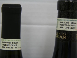 This photo shows the DOC number of a bottle of suspected counterfeit wine on the left, and the DOC number of an authentic bottle on the right. (Photo courtesy of the LCBO)