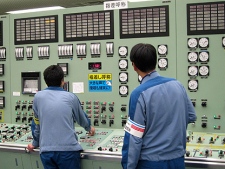 In this Sept. 2010 photo, Tokyo Electric Power Co. workers are seen at work at the central control room of reactor Unit 3 of the Fukushima Dai-ichi nuclear complex at Okumamachi, northeastern Japan. (AP Photo/Tokyo Electric Power Co. via Kyodo News) 