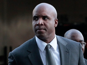 Former baseball player Barry Bonds arrives for his trial at federal court in San Francisco, Tuesday, March 29, 2011. (AP Photo/Jeff Chiu)