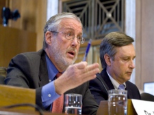 Dr. Peter Lyons, acting assistant Energy Secretary for Nuclear Energy, left, accompanied by Bill Borchardt, executive director for Operations, Nuclear Regulatory Commission (NRC) testifies on Capitol Hill in Washington, Tuesday, March 29, 2011, before the Senate Energy and Natural Resources Committee hearing on Japan's nuclear disaster. (AP Photo/Harry Hamburg)