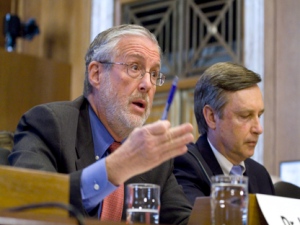 Dr. Peter Lyons, acting assistant Energy Secretary for Nuclear Energy, left, accompanied by Bill Borchardt, executive director for Operations, Nuclear Regulatory Commission (NRC) testifies on Capitol Hill in Washington, Tuesday, March 29, 2011, before the Senate Energy and Natural Resources Committee hearing on Japan's nuclear disaster. (AP Photo/Harry Hamburg)