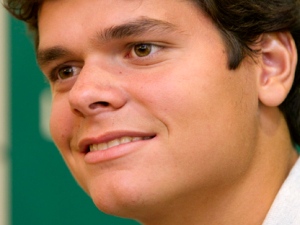 Canadian tennis player Milos Raonic smiles while speaking to reporters in Toronto on Thursday, March 31, 2011. The hard-serving young star from Thornhill, Ont., has rocketed up the tennis rankings to No. 37, improving 105 spots from the start of the 2011 season. (THE CANADIAN PRESS/Darren Calabrese)