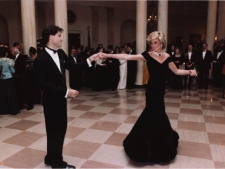 Several of the most famous gowns worn by Princess Diana are set to hit the auction block this summer in Toronto. Highlights include the dress Diana wore at the White House state dinner hosted by then-president Ronald Reagan and his wife, Nancy, when the princess famously danced with actor John Travolta on Nov. 9, 1985. (THE CANADIAN PRESS/AP-Ronald Reagan Library)