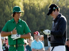 Rickie Fowler, left, and Rory McIlroy of Northern Ireland chat before teeing off on the first hole during the first round of the Masters golf tournament Thursday, April 7, 2011, in Augusta, Ga. (AP Photo/Charlie Riedel)