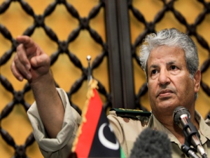 Libyan rebel military leader Abdel-Fattah Younis gestures as he speaks to the media about Thursday's attack on his forces, at a hotel in Benghazi, Libya Thursday, April 7, 2011. (AP Photo/Ben Curtis)