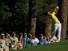 Y.E. Yang of Korea hits on the second fairway during the second round of the Masters golf tournament Friday, April 8, 2011, in Augusta, Ga. (AP Photo/Matt Slocum)