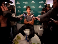 Canadian tennis player Milos Raonic speaks to reporters in Toronto Thursday, March 31, 2011. The hard-serving young star from Thornhill, Ont., has rocketed up the tennis rankings to No. 37, improving 105 spots from the start of the 2011 season. (THE CANADIAN PRESS/Darren Calabrese)