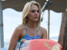 In this film publicity image released by TriStar Pictures, Carrie Underwood is shown in a scene from "Soul Surfer." (AP Photo/TriStar Pictures, Mario Perez)