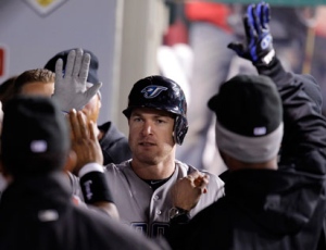 Toronto Blue Jays' Jayson Nix, center,  is greeted by teammates after hitting a home run in the eighth inning of a baseball game against the Los Angeles Angels in Anaheim, Calif., Friday, April 8, 2011. (AP Photo/Jae C. Hong)