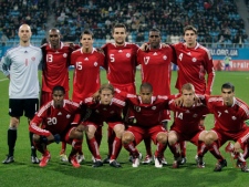 The Canadian national soccer team poses for a photo before its friendly soccer match against Ukraine at Lobanovskiy's stadium in Kiev, Ukraine, Friday, Oct. 8, 2010. (AP Photo/Andrey Lukatsky)