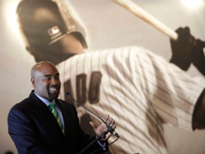 Former Blue Jay Carlos Delgado, of Puerto Rico, speaks to journalists after announcing his retirement in San Juan, Puerto Rico, Wednesday April 13, 2011. The two-time All-Star played 17 major league seasons, finishing with 473 home runs and a .280 batting average. (AP Photo/Ricardo Arduengo)