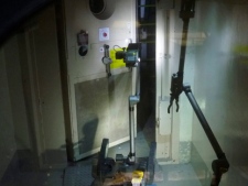 In this image released by Tokyo Electric Power Co., a radio-controlled PakBot robot opens a door inside housing for the reactor of Unit 3 during inspection of the tsunami-damaged facilities at the Fukushima Dai-ichi Nuclear Power Plant on Sunday, April 17, 2011 in Okuma, Fukushima Prefecture, northeastern Japan. (AP Photo/Tokyo Electric Power Co.)