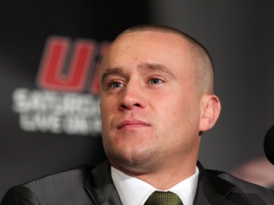 UFC 129 fighter Mark Hominick listens to a question at a news conference in Toronto on Tuesday February 8, 2011. (THE CANADIAN PRESS/Frank Gunn)