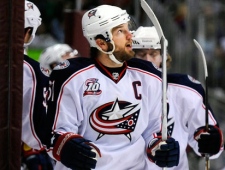 Columbus Blue Jackets right wing Rick Nash celebrates a goal with his teammates in the first period of an NHL hockey game against the Colorado Avalanche in Denver on Tuesday, March 22, 2011. (AP Photo/Chris Schneider)