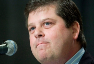 Dave Nonis pauses during a news conference in Vancouver on April 16, 2008. Nonis is serving as the GM of Canada's entry at the IIHF World Hockey Championship. (THE CANADIAN PRESS/Jonathan Hayward)