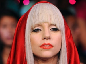 In this Aug. 12, 2008, file photo Lady Gaga makes an appearance at MTV Studio's in Times Square for MTV's "Total Request Live" show in New York. (AP Photo/Peter Kramer)