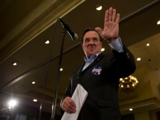 Minister of Finance Jim Flaherty speaks prior to Prime Minister Stephen Harper delivering a speech at a campaign rally in Ajax Ont., on Wednesday, April 6, 2011. (THE CANADIAN PRESS/Sean Kilpatrick)