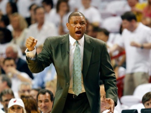 Boston Celtics coach Doc Rivers yells instructions to his players during their game against the Miami Heat during the first half of Game 5 of a second-round NBA playoff basketball series in Miami, Wednesday, May 11, 2011. (AP Photo/J Pat Carter)