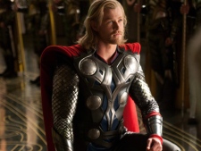 In this film publicity image released by Paramount Pictures, Chris Hemsworth portrays the title character in a scene from the film, "Thor." (AP Photo/Paramount Pictures-Marvel Studios, Zade Rosenthal)