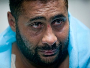 An injured man reacts at a hospital following an airstrike in Tripoli, Libya, early Tuesday, May 24, 2011. NATO warplanes bombarded targets in Tripoli with more than 20 airstrikes early Tuesday, striking around Moammar Gadhafi's residential compound in what appeared to be the heaviest night of bombing of the Libyan capital since the Western alliance launched its air campaign against his forces. (AP Photo/Darko Bandic)