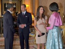 U.S. President Barack Obama, left, and first lady Michelle Obama, right, talk to Britain's Prince William, 2nd left, and the Duchess of Cambridge at Buckingham Palace, in London Tuesday May 24, 2011. President Barack Obama and first lady Michelle Obama traded-in Irish charm for the pomp and pageantry of Buckingham Palace Tuesday as they opened a two-day State Visit to Britain at the invitation of Queen Elizabeth II. (AP Photo/Toby Melville, Pool)