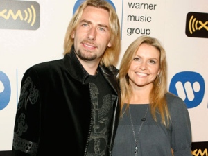 Chad Kroeger, left, and his wife, Marianne Goriuk, arrive at Warner Music Group post-Grammy party on Sunday, Feb. 10, 2008, in Los Angeles. (AP Photo/Matt Sayles)