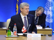 Prime Minister Stephen Harper takes part in a working session during the G8 Summit in Deauville, France on Friday, May 27, 2011. Following the G8, Harper will also visit Greece. (THE CANADIAN PRESS/Sean Kilpatrick)