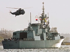 A Sea King helicopter flies by the Canadian warship HMCS Charlottetown, a Halifax-class patrol frigate, as it sails from Halifax harbour, on Thursday, Nov. 1, 2007. A Canadian warship has helped fend off an attack by Libyan forces on the port city of Misrata despite coming under fire itself. A statement from NATO says the frigate HMCS Charlottetown was conducting patrols with other allied vessels when a number of fast small boats launched an attack. (THE CANADIAN PRESS/Andrew Vaughan)