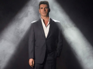 In this undated publicity photo released by Fox, Simon Cowell, from "The X Factor," is shown. (AP Photo/Fox, Ian Derry)