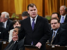 Minister of Foreign Affairs John Baird delivers a speech during the debate on the mission in Libya in the House of Commons on Parliament Hill in Ottawa on Tuesday, June 14, 2011. THE CANADIAN PRESS/Sean Kilpatrick